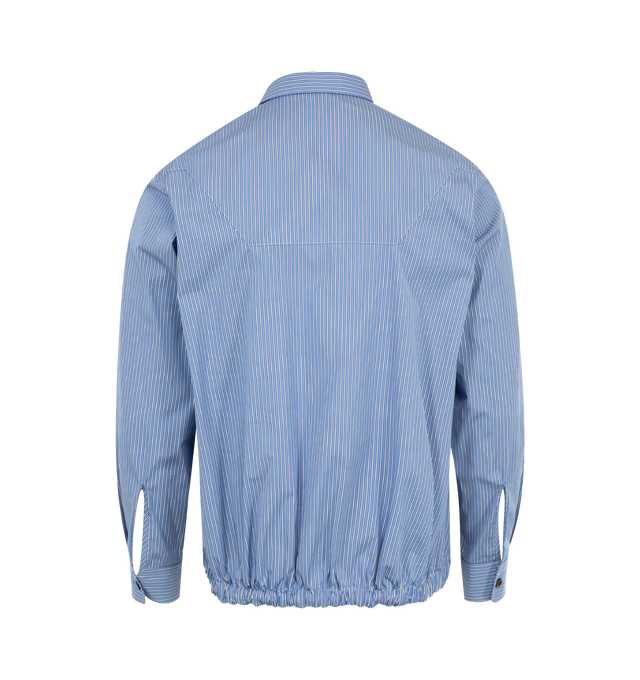 Image 2 of 2 - BLUE - Sacai Thomas Mason Jacket has a spread collar with a double collar design, a relaxed fit, a button front closure, button cuffs, button slits at the sides, front flap pockets, and a flared hem. 100% cotton.  