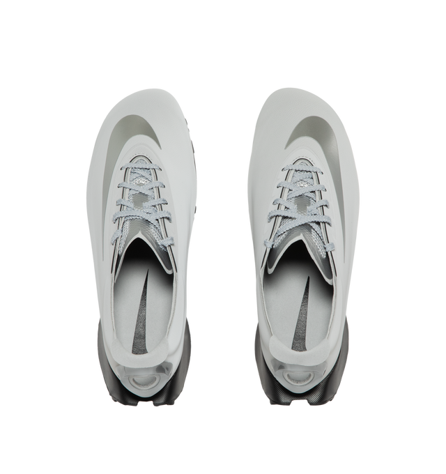 Image 5 of 5 - SILVER - Nike First Sight Noir Sneakers feature smooth textile uppers with tonal rubber overlays and a sculpted wedge sole for a futuristic take on retro running style. These lifestyle sneakers combine lightweight comfort with modern design, finished with chrome-effect detailing at the heel for a bold statement. Main Material: Textile and Synthetic. Sole: Rubber. 