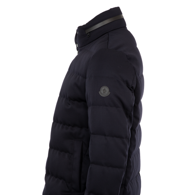 Image 3 of 3 - NAVY - MONCLER Vallonpierre Wool Long Down Jacket featuring woolplus, polyester lining, down-filled, pull-out hood, zipper and button closure, pockets with snap button closure, zipped inner pocket and leather logo patch. 100% virgin wool. Lining: 100% polyester. Padding: 90% down, 10% feather. 