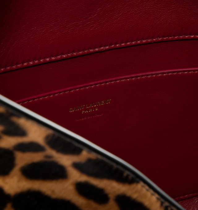 Image 3 of 3 - BROWN - SAINT LAURENT Large Pony Hair Chain Pouch in leopard-print pony hair leather, logo on front, stowable cable-chain strap, leather lining, bronze-tone hardware, snap-button closure and one zip pocket. 11.6" x 7" x 2". Calfskin leather. Made in Italy. 