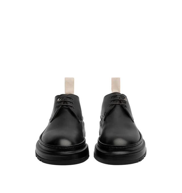 Image 2 of 3 - BLACK - JACQUEMUS Les Derbies Pavane Shoes featuring polished leather derbies, round toes, square and circle eyelets, waxed cotton laces, topstitching details, embroidered grosgrain puller, embossed logo on insole and notched rubber soles. 100% cowskin. Sole: 100% rubber. Made in Italy. 