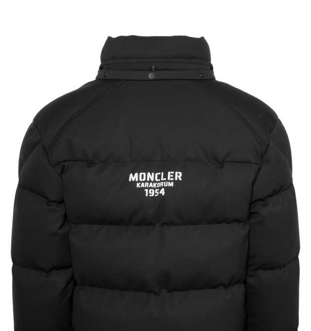 Image 3 of 4 - BLACK - A forward-looking design, the Moncler Karakorum is crafted from elastic technical jersey. Originally designed in 1954 for the first expedition to K2, Moncler Karakorum is created to withstand the harshest climates: the hood, zipper, and double button closure are there to keep you as warm as possible. Internal suspenders allow you to carry the down jacket on your back, giving you maximum freedom of movement. The jacket is adorned with a signature patch pocket on the chest, while the ba 