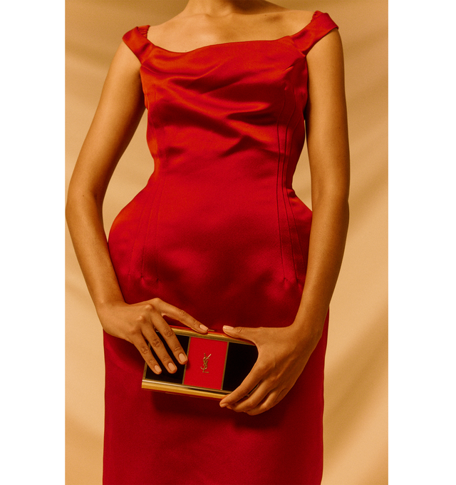 Image 2 of 4 - RED - SAINT LAURENT Minaudire Clutch featuring two-tone, decorated with the cassandre, leather lining, bronze-toned hardware and push-box clasp. 7.5" x 3.9" x 1". Strap drop: 11.8". Polyester, metal. Made in Italy. 