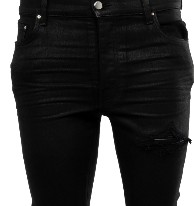 Image 3 of 3 - BLACK - AMIRI Wax Jeans featuring belt loops, five-pocket styling, button-fly, hand-distressed detailing at front, quilted grained leather underlay at legs, leather logo patch at back waistband and logo-engraved silver-tone hardware. 92% cotton, 6% elastomultiester, 2% elastane. Trim: 100% leather. Made in United States. 