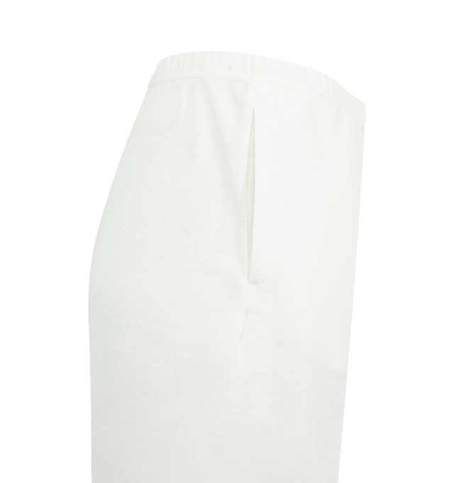 Image 3 of 3 - WHITE - THE ROW Kohana Pant featuring relaxed low-rise sweatpant in ultrasoft Japanese cotton jersey with straight leg, elastic drawstring waist, and side slash pockets. 100% cotton. Made in Italy. 