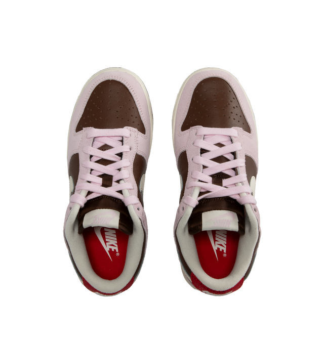 Image 5 of 5 - PINK - Nike Dunk Low Sneakers with "Cacao Wow" brown and "Pink Foam" color-blocking and a cream colored Swoosh,  a padded, low-cut collar, leather upper with a slight sheen and durability, foam midsole offering lightweight, responsive cushioning. Perforations on the toe add breathability. Rubber sole with classic hoops pivot circle provides durability and traction. 