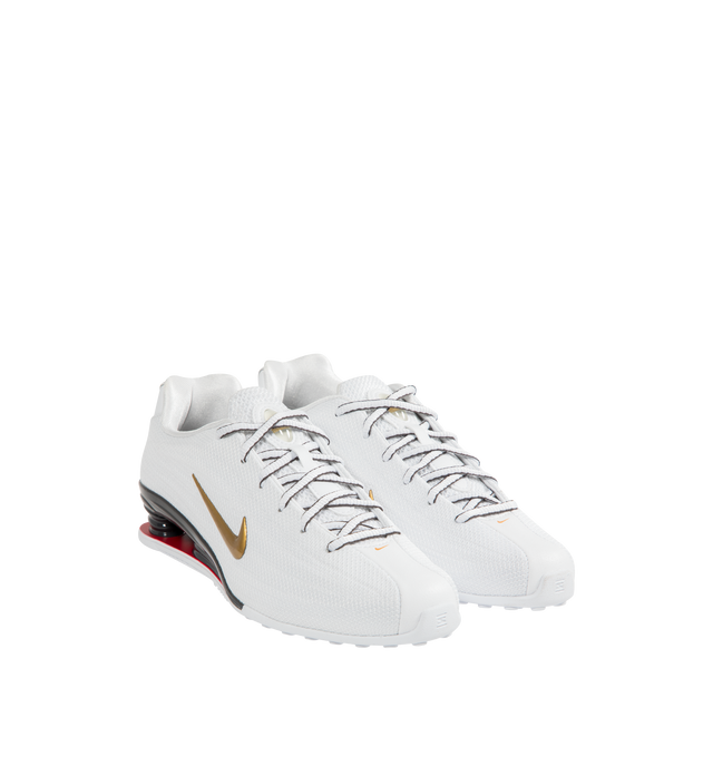 Image 2 of 5 - WHITE - NIKE Shox Z Sneaker featuring a slim, low-profile shape, textile upper, synthetic leather accents, Nike Shox columns, circular Waffle outsole, foam midsole and rubber outsole. 