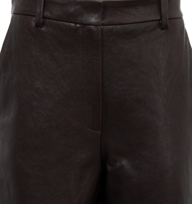 Image 4 of 4 - BROWN - KHAITE Caiton Leather Wide-Leg Cargo Pants featuring cargo pants in lambskin leather with leg patch pockets, mid rise sits high on hip, flat front, angled side slip pockets, back welt pockets, wide legs, full length and hook zip fly and belt loops. Leather. Made in Romania. 