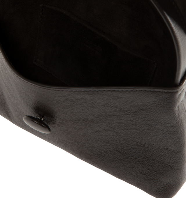 Image 3 of 3 - BROWN - The Row Sally Bag is crafted from waxed calfskin leather and features a compact top-handle silhouette with a flat handle, a flap closure, and a leather-covered button for a clean, minimalist finish. This designer leather handbag combines exceptional Italian craftsmanship with timeless elegance, making it an effortless choice for carrying everyday essentials. Main Material: 100% Calfskin Leather. Lining: 100% Lambskin Leather. Dimensions: 7.1 x 4.7 x 1.2 in. Made in Italy 