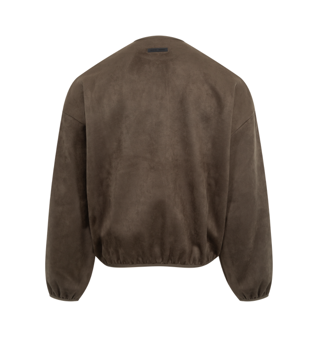 Image 2 of 2 - BROWN - Fear of God Essentials Modern Crewneck Sweatshirt is crafted from bonded suede fleece, offering a plush, suede-like hand feel that complements the modern fit with a wider oversized silhouette. The piece is detailed with a HD-printed Fear of God Essentials lockup, while finishing touches include short rib-knit collar, cuff, and waist hem. A Fear of God Essentials rubberized label stitched at the back collar. 8% cotton / 92% Polyester fleece. 