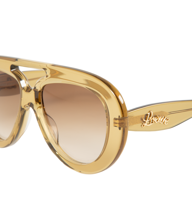 Image 3 of 3 - NEUTRAL - LOEWE Curvy Pilot Acetate Sunglasses featuring bomb acetate, curvy logo on the temples, solid lenses, saddle nose bridge and tapered arms. Acetate. 100% UVA/UVB protection. 