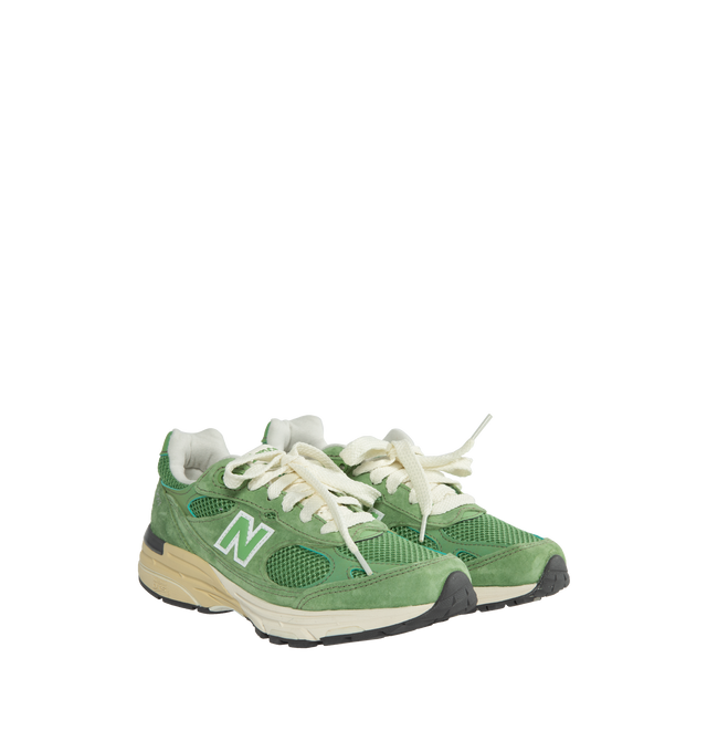 Image 2 of 5 - GREEN - New Balance Made in USA 993 Sneaker 993 in a streamlined design with fine-tuned the ABZORB midsole cushioning, mesh upper, overlaid with premium nubuck, outfitted in a striking 'chive' green, atop a dual color white and off-white midsole with reflective accents.  ABZORB midsole absorbs impact through a combination of cushioning and compression resistance.  ACTEVA cushioning delivers versatile, flexible support?. Full-length rubber outsole with Ndurance rubber heel for added durability 