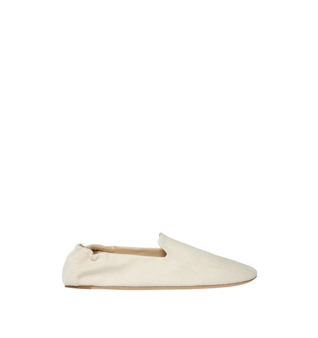 Image 1 of 4 - NEUTRAL - The Row Mens Casa Slippers feature a slip-on silhouette, lambskin leather lining, and calfskin leather sole. Main Material: Textile upper Lining: Lambskin Leather; Sole: Calfskin Leather. Made in Italy. 