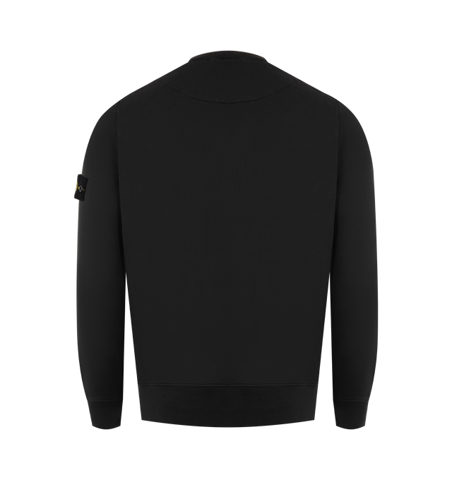 Image 2 of 3 - BLACK - STONE ISLAND Crewneck Sweatshirt featuring ribbed neckline, lunette under back neckline with internal reinforcement, raglan sleeves on back, Stone Island badge on left sleeve, ribbed cuffs and bottom band, overlock stitching at seams and regular fit. 100% cotton. 