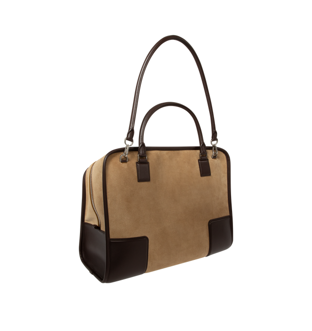 Image 3 of 5 - BROWN - Loewe Mens Amazona 180 XL Bag is crafted from suede with soft calfskin details. Features a relaxed silhouette, single toron top handle, removable shoulder handle, adjustable crossbody strap, zip closure with two leather pullers, two compartments with concealed magnetic closure, interior flat pocket, side D-ring, suede and nappa lambskin lining, palladium-tone hardware, and embossed LOEWE and Double L branding. Dimensions: 40  31  16 cm; Strap Length: 105133 cm; Strap Drop: 4761 cm; Ha 