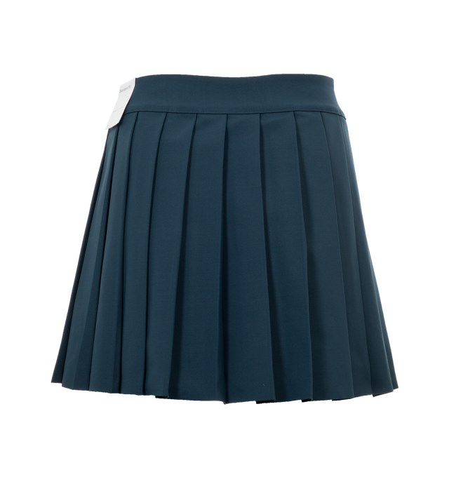 Image 2 of 3 - NAVY - Nike X Yoon women's mini skirt- smooth in the front and pleated in the back, crafted from mid-weight stretch fabric featuring hidden outseam, collegiate sport taping at inner waistband and woven Yoon Ahn label.  Face of fabric: 100% polyester. Back of fabric: 40% acrylic/29% polyester/28% rayon/3% spandex. 