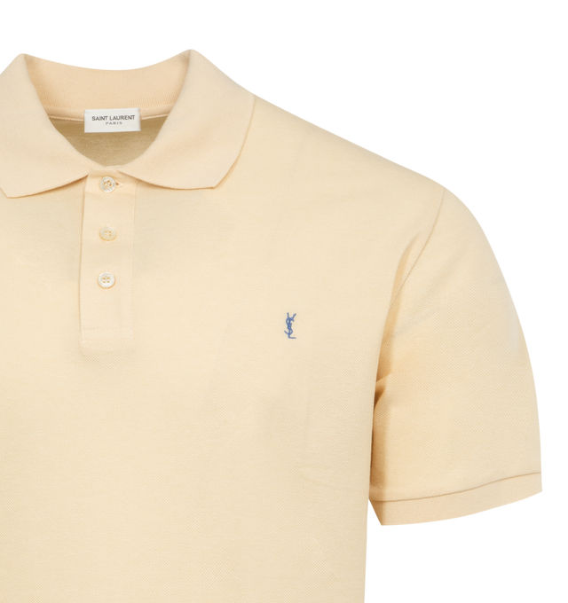 NEUTRAL - SAINT LAURENT Short Sleeve Polo Shirt featuring a cassandre embroidery on the chest. 50% cotton 50% recycled cotton. Made in Italy.