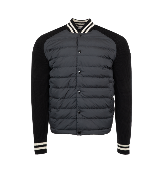 Image 1 of 2 - BLACK - MONCLER Padded Cardigan featuring lightweight micro chic nylon lining, down-filled, half brioche stitch, Gauge 7, snap button closure, front slant pockets and synthetic material logo patch. 100% cotton. 100% polyester. Padding: 90% down, 10% feather. 