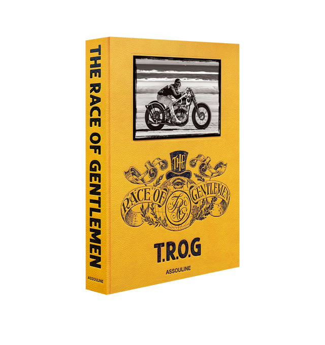 Image 1 of 5 - YELLOW - ASSOULINE The Race of Gentlemen. Beloved by a band of speed demons and rule breakers decked out in leather-strapped pilot goggles and long, wiry beards, the Race of Gentlemen, or TROG as its affectionately come to be known, is a yearly celebration of American hot rod culture. It takes place once a year on the sandy beaches of Wildwood, New Jersey, where competitors and enthusiasts alike gather in the name of speed. Vintage cars, motorcycles and other weathered machines are raced more 