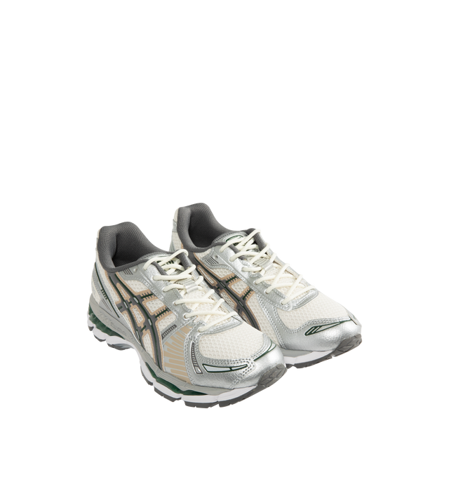 Image 2 of 5 - GREY - ASICS Gel-Kayano 12.1 Sneaker featuring breathable mesh underlays, GEL-NIMBUS17 tooling system, FLUIDRIDE technology, rearfoot and forefoot GEL technology and dope dyed recycled sockliner mesh. 