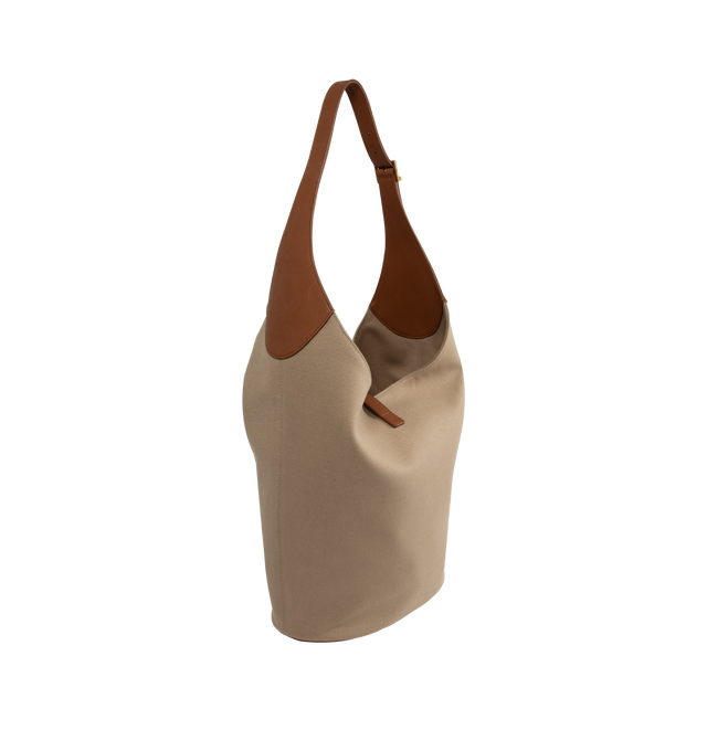 Image 2 of 3 - BROWN - SAINT LAURENT Le 5  7 Hobo Bag in Canvas and Leather featuring vegetable-tanned leather, defined by its leather tab closure decorated with the cassandre.Spacious and lined in cotton and linen, it features one main compartment with an inner zip pocket, an adjustable strap, bronze-toned hardware and four metal feet. 10.217.3" x 12.6" x 1.2". Handle drop: 13". Canvas/calfskin. Made in Italy. 