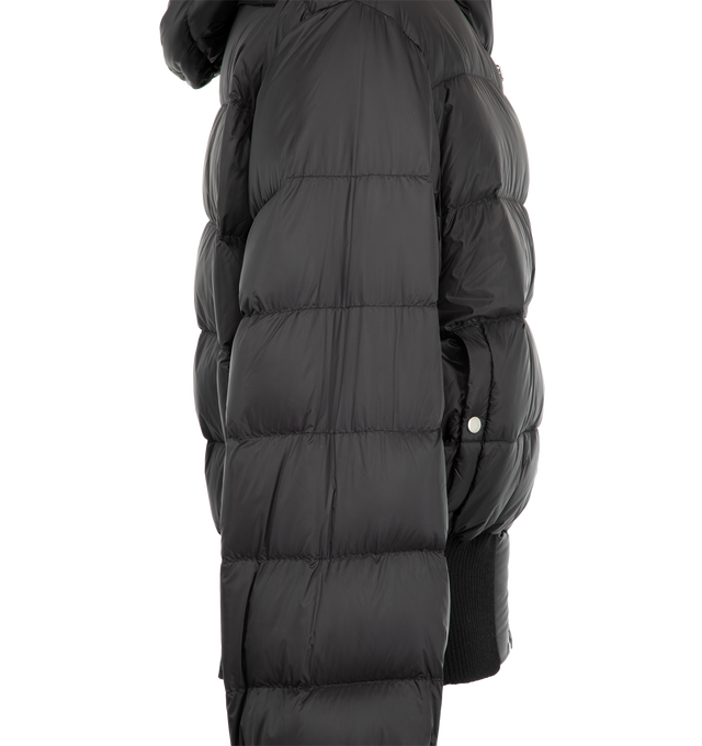 Image 3 of 3 - BLACK - Rick Owens Men's Hooded Jacket is crafted from nylon and insulated with premium down for exceptional warmth in a streamlined silhouette. Designed with a short-length cut, this hooded jacket features a metal front zipper and knit wool detailing that enhances comfort and structure. Combining functional cold-weather performance with Rick Owens' signature minimalist aesthetic, it offers a refined outerwear option for everyday wear. Main Material: 100% Nylon. Knit Trim: 100% Wool. Padding: 