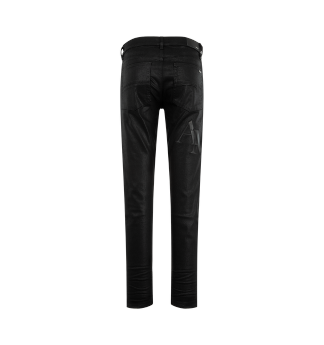 Image 2 of 3 - BLACK - AMIRI Staggered Logo Waxed Skinny Jeans featuring waxed stretch cotton denim, stacked Amiri logo on the left thigh, classic five-pocket styling and button zip closure. Cotton/polyester/elastane. Made in USA. 