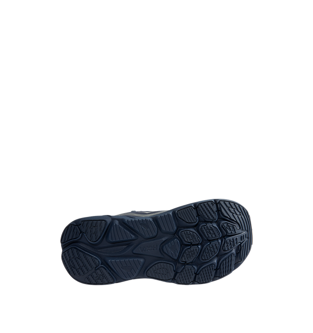 Image 4 of 5 - NAVY - Hoka Women's Clifton 11 GTX Running Sneakers feature a closed-mesh upper with a GORE-TEX Invisible Fit membrane and PFC-free water-repellent treatment. An adjustable speed-lace system with toggle, reflective details, a compression-molded EVA midsole, and a Durabrasion rubber outsole with forefoot traction pods complete the weather-ready design. Upper: Mesh with GORE-TEX Membrane. Midsole: EVA Foam. Sole: Rubber. Heel-to-Toe Drop: 8 mm. 