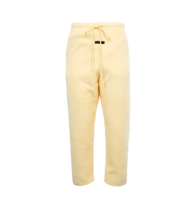 YELLOW - FEAR OF GOD ESSENTIALS Polar Fleece Pant featuring drawstring at elasticized waistband, rubberized logo patch at front, gusset at dropped inseam, zip pockets and two-pocket styling. 83% polyester, 17% acrylic. Made in China.