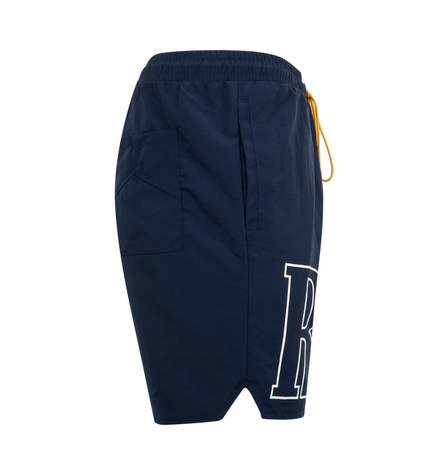 Image 3 of 3 - NAVY - RHUDE Logo Short featuring premium washed nylon short with logo print across front legs, twin zipper pockets with matching tonal Rhude Pill hardware and extended drawstrings. 100% nylon.  