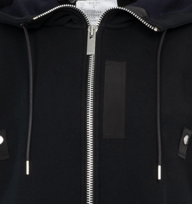 Image 3 of 3 - BLACK - SACAI Sponge Sweat Hoodie featuring drawstring at hood, funnel neck, two-way zip closure, rib knit hem and cuffs and logo-engraved silver-tone hardware. 62% cotton, 38% polyester. Trims: 100% nylon. Made in Japan.  