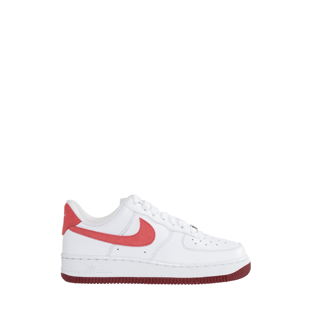 WHITE - NIKE Air Force 1 '07 featuring leather upper, low-top, cushioned collar, perforated vamp and quarter for improved breathability, foam midsole, full-length Air cushioning, rubber outsole with pivot circle and classic lace closure.