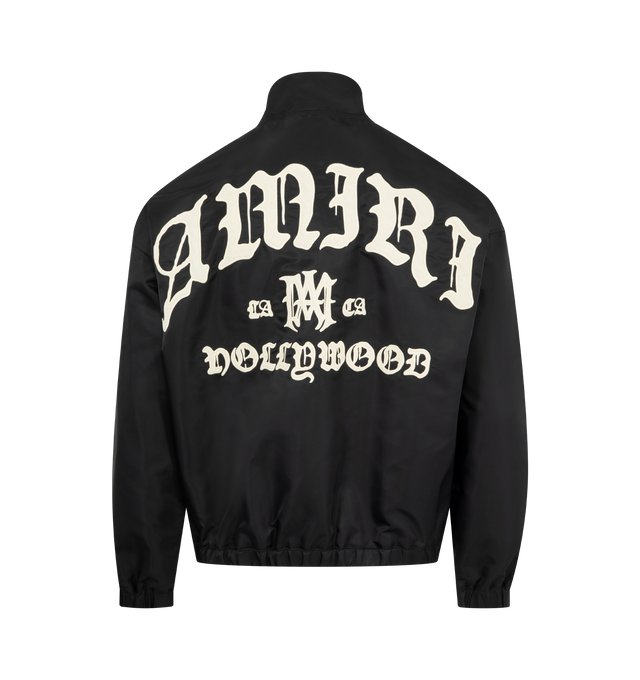 Image 2 of 3 - BLACK - AMIRI Hollywood Jacket featuring nylon twill, stand collar, zip closure, logo appliqu at chest and back, zip seam pockets, elasticized hem and cuffs, text appliqu at back, welt pocket at interior and full satin lining. 100% polyamide. Made in Italy. 