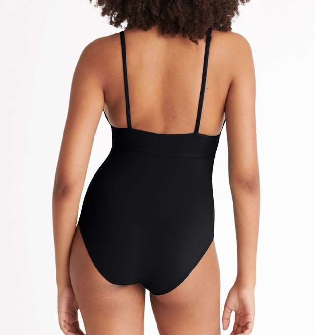 Image 5 of 6 - BLACK - ERES Larcin One-Piece Triangle Swimsuit featuring thin straps, V-neckline and underbust seam. 84% Polyamid, 16% Spandex. Made in France. 