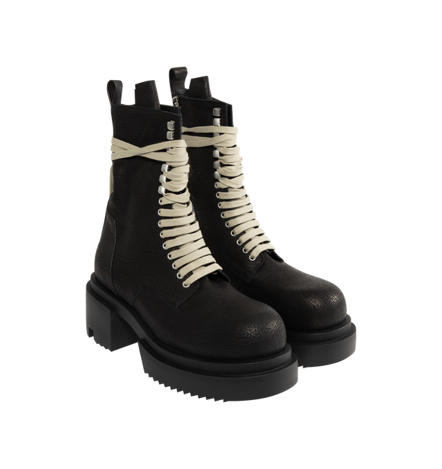 Image 2 of 4 - BLACK - Rick Owens Men's lace-up Bogun boots crafted from washed calf leather. Mid-calf height, rounded toe style featuring a zipper on the leg for easy fastening, eyelets and hooks with long laces that wrap around the ankle and a back pull tab. Rubber mega creeper sole with toothed square 6cm high heel. 100% calf leather upper, lining and insole. Thermoplatic polyurethane sole.  Made in Italy. 