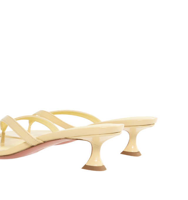 Image 4 of 5 - NEUTRAL - AMINA MUADDI Juliette Thong Sandal featuring rounded open toe, thong strap and 45mm mini CL heel. 100% lambskin. Made in Italy.  