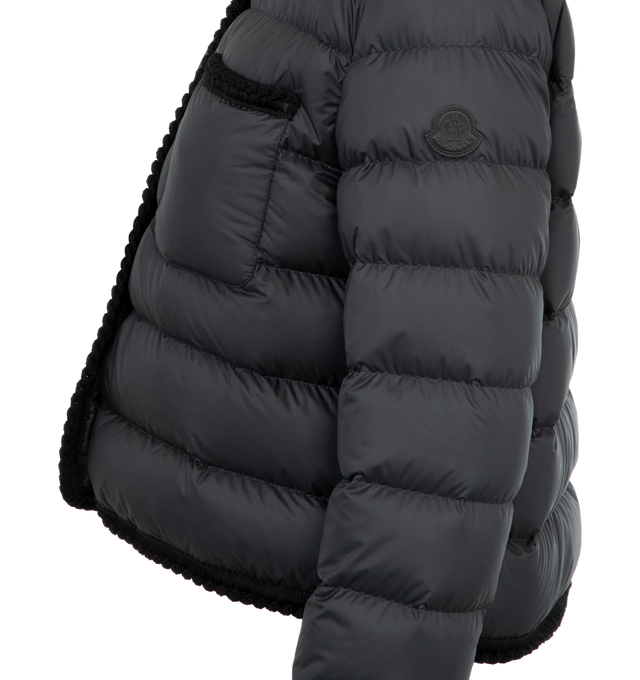 Image 3 of 3 - BLACK - Moncler Gencay Down Jacket has a jewel neck, a front snap closure, chest patch pockets, braided trim, and channel quilting. Lined. 90% down, 10% feather fill. 100% polyester exterior. Made in Romania.  