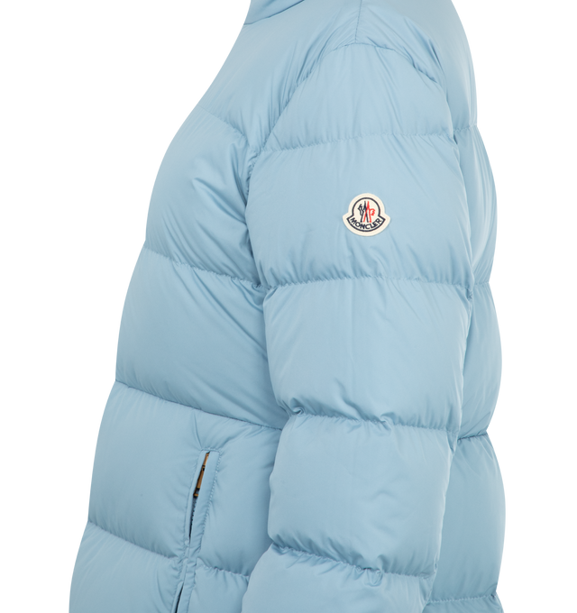 Image 3 of 3 - BLUE - MONCLER Dourbe Hooded Short Down Jacket featuring recycled longue saison, recycled longue saison lining, down-filled, pull-out hood, zipper closure, zipped welt pockets, elastic cuffs and hem with drawstring fastening. 100% polyester. Padding: 90% down, 10% feather. 