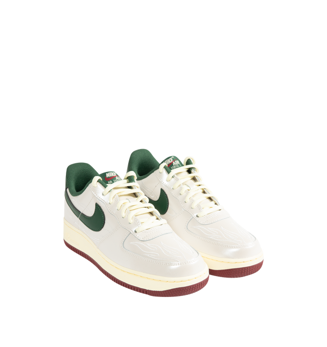 Image 2 of 5 - WHITE - NIKE Air Force 1 '07 LV8 Sneaker featuring classic silhouette with genuine and synthetic leather upper with perforated toe box, Nike Air unit, rubber outsole with classic pivot circles and padded collar. 