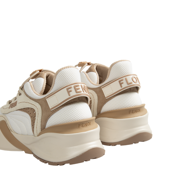 Image 3 of 5 - WHITE - Fendi Flow Sneakers have elastic laces, a side zipper closure, fabric details, embossed logos, and rubber soles. 100% calfskin. Made in Italy.  