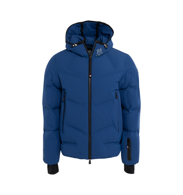 BLUE - MONCLER GRENOBLE ACRESAZ JACKET is made with 2L 4-way, stretch tech poplin, stretch nylon lining, down-filled, has heat-sealed seams, adjustable hood with drawstring fastening, DAY-NAMIC" transfer, "MONCLER" lettering, YKK� Aquaguard� Highly Water Resistant zipper closure, exterior pockets with interior media pocket, stretch jersey wrist gaiters, ski pass pocket with YKK� Aquaguard� Highly Water Resistant zipper closure, hem with elastic drawstring fastening and embossed silicone logo.