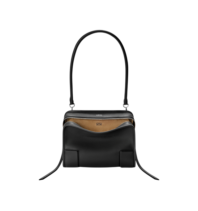 Image 10 of 17 - BLACK - Loewe Amazona Medium 180 Bag in soft calfskin leather featuring a relaxed silhouette with a single toron top handle, designed to be carried open, while a concealed closure secures the main compartment, removable shoulder and crossbody straps, zip closure with two leather zip pullers, two compartments, main compartment closed with magnetic closure, internal flat pocket, suede lining and embossed logo. Soft calfskin. Strap length 108 cm; Strap Drop 50 cm; Handle drop 11 - 28 cm; Heigh 