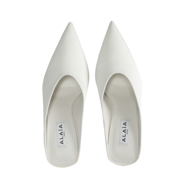 Image 4 of 4 - WHITE - Alaia Wedge Mules have pointed toes, a streamlined design, and cubic heels. 75MM. Made in Italy.  