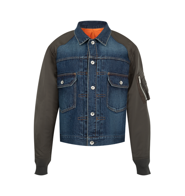 Image 1 of 4 - BLUE - Sacai denim bomber blouson with cotton denim front panel and contrast nylon twill sleeves. Features a classic collar, button-front closure, contrast stitching, patch pockets with flap and button, zip pocket on the sleeve, ribbed hem and cuffs, and back central crease. Outer is 100% cotton denim with 100% nylon sleeves and 100% polyester lining. Made in Japan. 