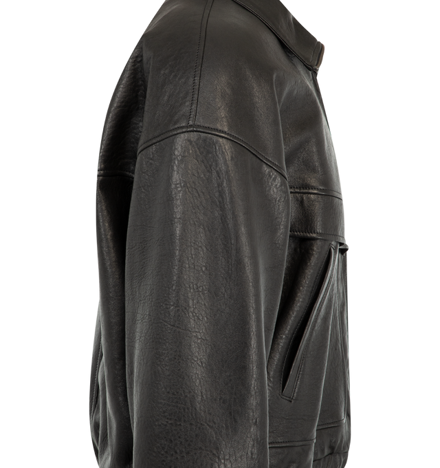Image 3 of 3 - BLACK - Saint Laurent Mens Leather Jacket is crafted from crinkled grained lamb leather. Features a relaxed fit, high neckline, front zip closure, side welt pockets, interior pocket, elasticized cuffs and hem, and full lining. Main Material: 100% Lamb Leather; Lining: 56% Cotton, 44% Viscose; Pocket Lining: 100% Cotton. Made in Italy. 