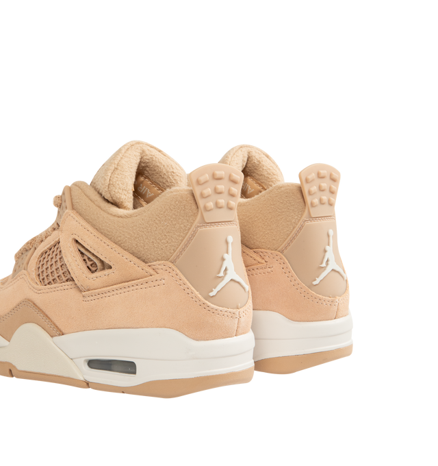 Image 3 of 5 - BROWN - NIKE Air Jordan 4 Retro Sneaker featuring velvety nubuck and smooth leather, metallic silver accents, real and synthetic leather combines with grid mesh underlays, Max Air cushioning, free-floating eyestays near the ankle and rubber outsole with herringbone tread pattern. 
