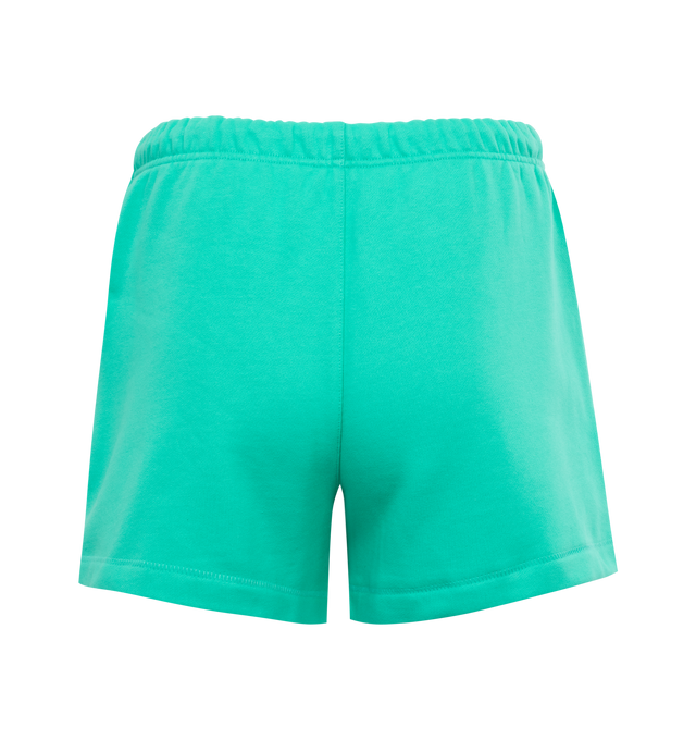 GREEN - FEAR OF GOD ESSENTIALS Running Shorts featuring rubber brand label, side hand pockets, elastic waistband, long drawstrings, cropped length and relaxed fit. 80% cotton, 20% polyester.