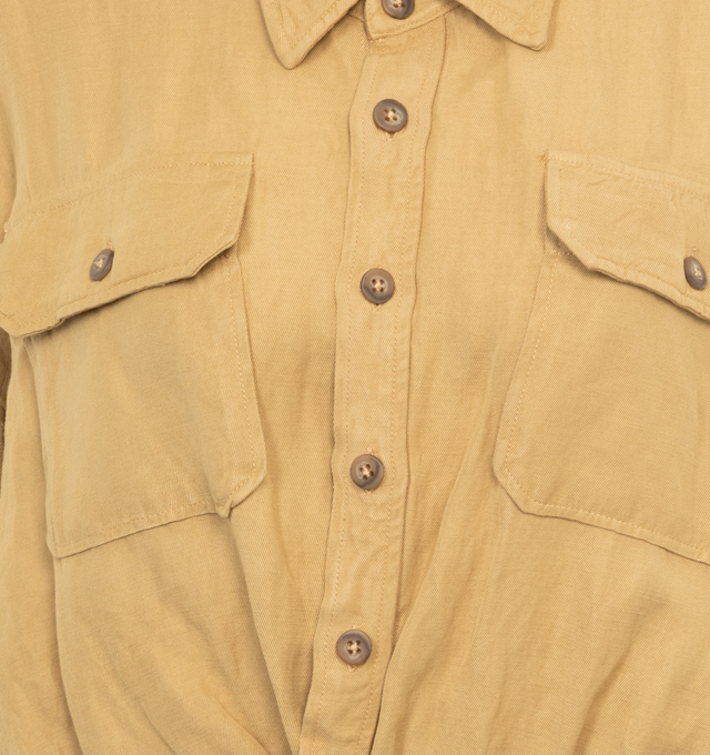 Image 3 of 3 - NEUTRAL - R13 Cross-over utility bubble shirt in khaki linen blend fabric featuring an elastic band at the hem and criss-crossed plackets. Buttons at the front are not designed to fully close along the plackets. Viscose/Linen blend. Made in USA.  