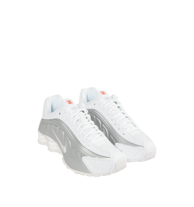 Image 2 of 5 - WHITE - NIKE Shox R4 Sneaker featuring Shox columns in the heel, synthetic and textile upper, Nike Shox technology, modified, circular Waffle outsole, laser perforations throughout, foam midsole and rubber outsole. 