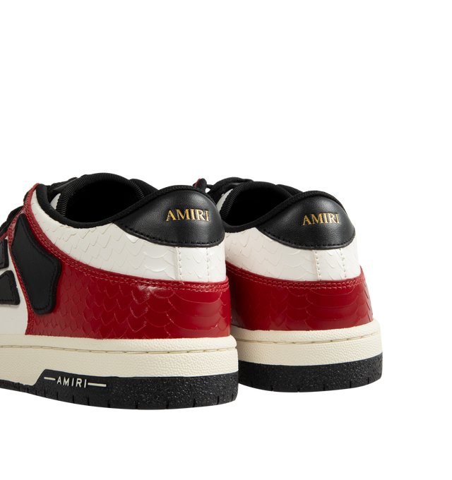 Image 3 of 5 - RED - Amiri Lunar New Year Skel Top Low Sneakers are a lace-up style with perforation details, signature graphics, leather appliques, and two-tone rubber soles. Leather uppers. 